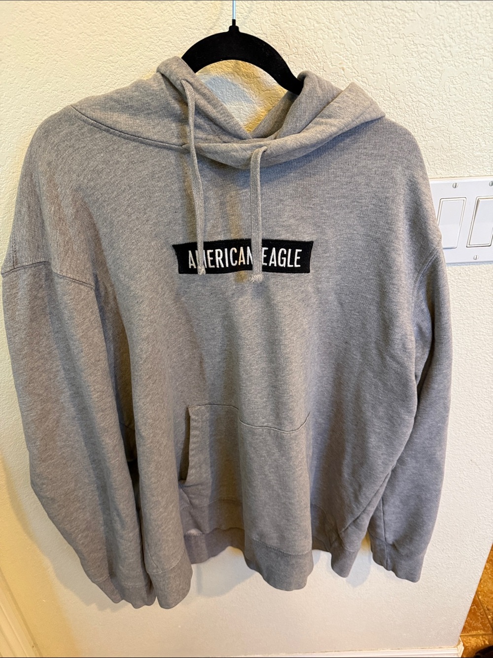 American Eagle Outfitters Grey Crewneck Sweatshirt with Black Logo Patch